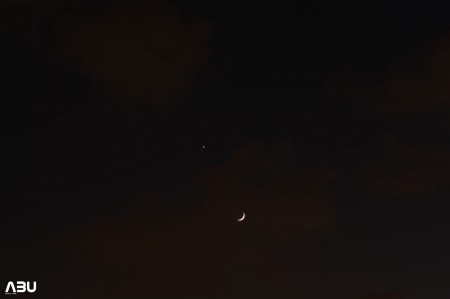 Beautiful pairing of Moon (behind thin clouds) and Venus